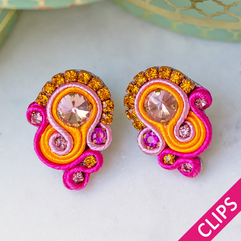Schöne Soutache-Ohrclips in leuchtendem Pink und Orange