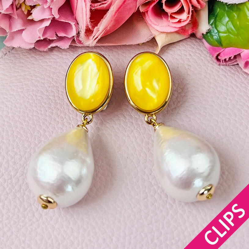 Gelbe Ohrclips mit federleichten Baumwolltropfen von AmuseToi