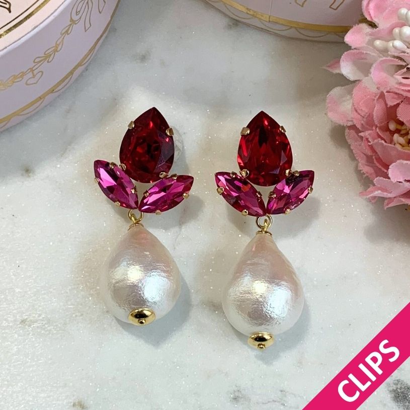 Funkelnde Ohrclips in Rot und Pink mit federleichten Baumwolltropfen