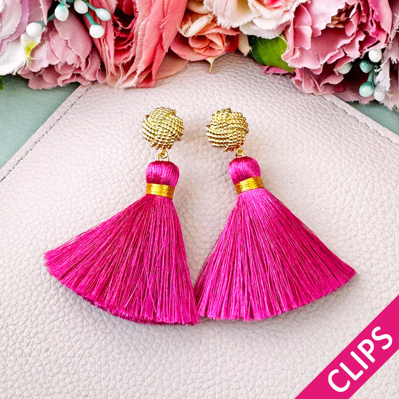 Vergoldete Knoten-Ohrclips mit pinker Quaste