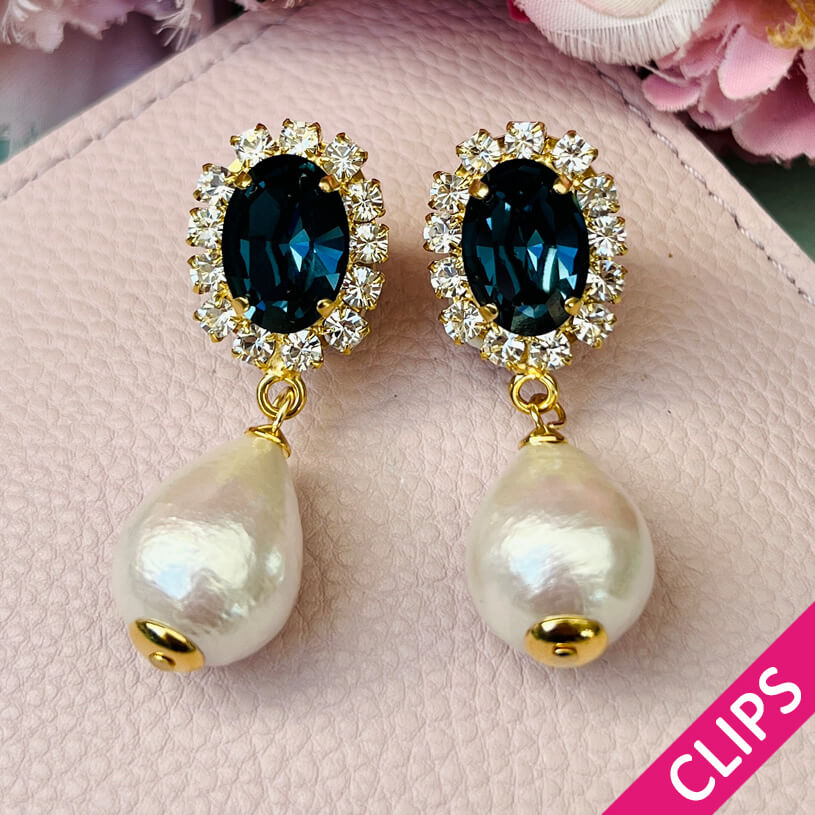 Edel funkelnde Ohrclips in Dunkelblau mit leichtem Baumwolltropfen