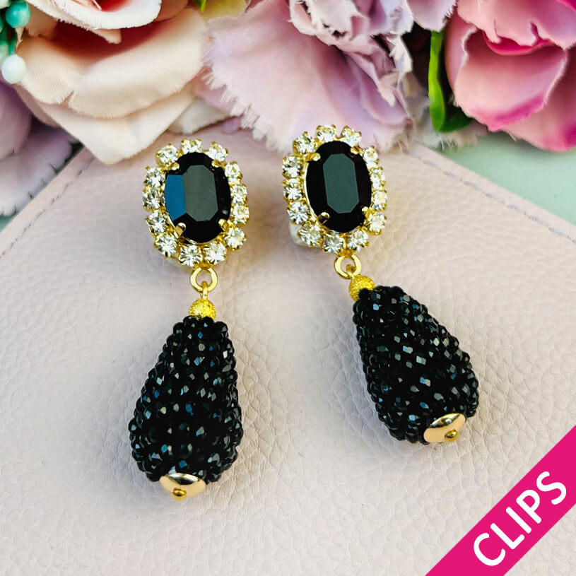 Edel funkelnde Ohrclips in Schwarz mit glitzerndem Tropfen