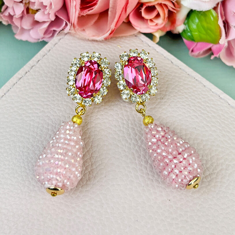 Edel funkelnde Ohrstecker in Rosa mit glitzerndem Tropfen