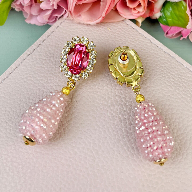 Edel funkelnde Ohrstecker in Rosa mit glitzerndem Tropfen