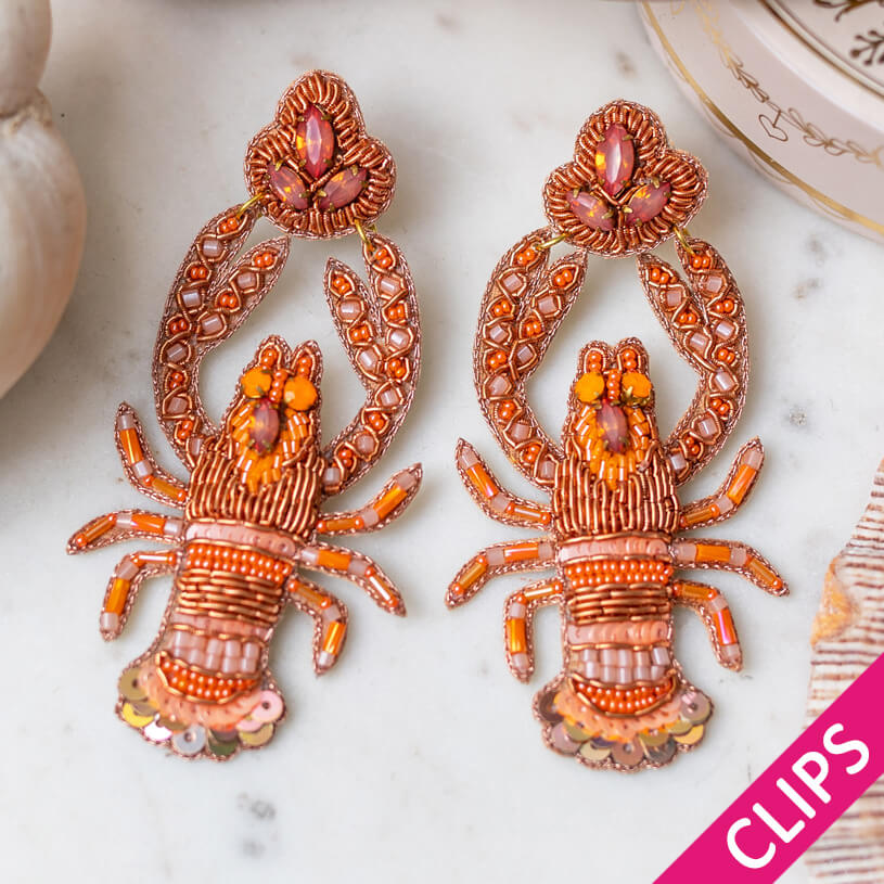 Auffällige Soutacheohrclips als Hummer