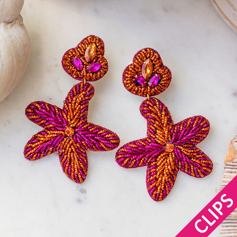 Auffällige Soutacheohrclips als pink-oranger Seestern