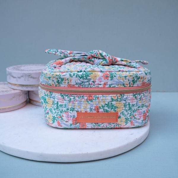 Stoff-Kosmetiktasche mit Schleife mit grün-orangem Blumen-Muster