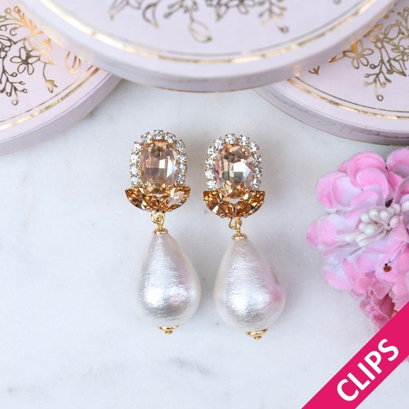 Champagnerfarbene Glas-Kristall-Ohrclips mit Baumwolltropfen