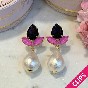 Funkelnde Ohrclips in Violett und Rosa mit federleichten Baumwolltropfen