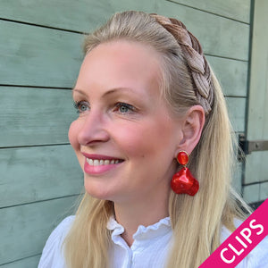 Orange Ohrclips mit Blütenblättern