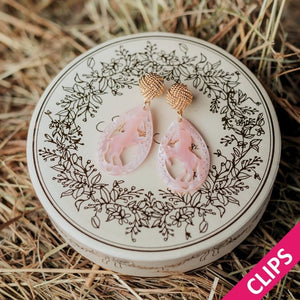 Vergoldete Knoten-Pferde-Ohrclips in Rosa von AmuseToi