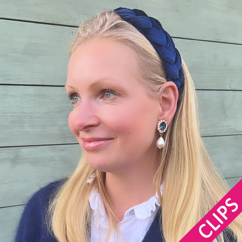 Edel funkelnde Ohrclips in Dunkelblau mit leichtem Baumwolltropfen