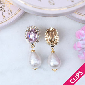 Edel funkelnde Ohrclips in Rosa mit leichtem Baumwolltropfen