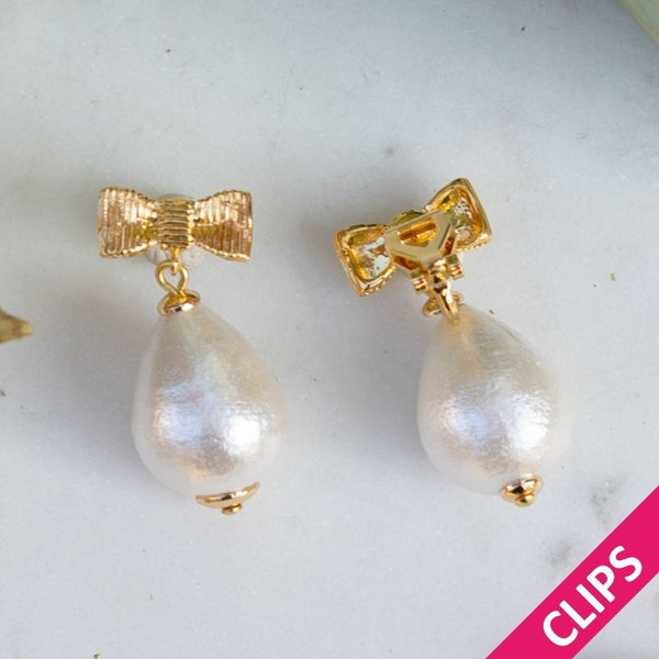 Elegante Schleifenohrclips mit leichtem Baumwolltropfen