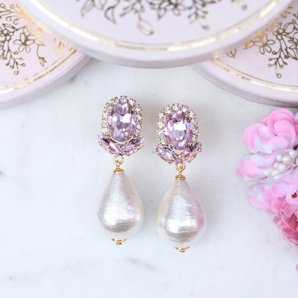Rosafarbene Glas-Kristall-Ohrstecker mit Baumwolltropfen