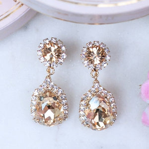 Champagnerfarbene Glas-Kristall-Ohrstecker mit Kristalltropfen