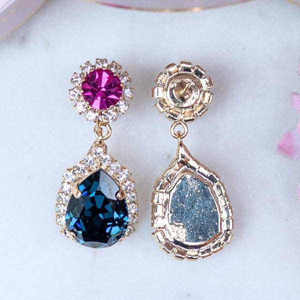 Pinke Glas-Kristall-Ohrstecker mit dunkelblauem Kristalltropfen