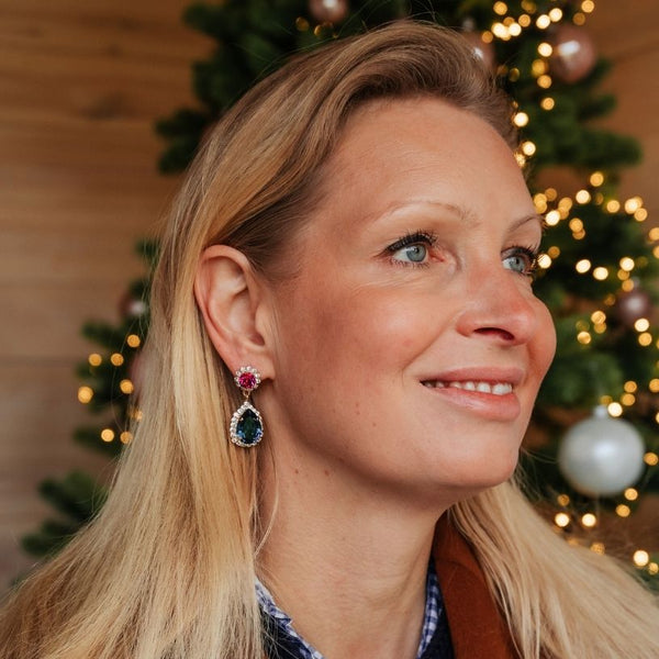 Pinke Glas-Kristall-Ohrstecker mit dunkelblauem Kristalltropfen