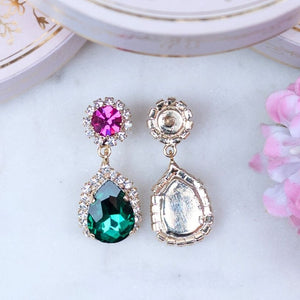 Pinke Glas-Kristall-Ohrstecker mit dunkelgrünem Kristalltropfen