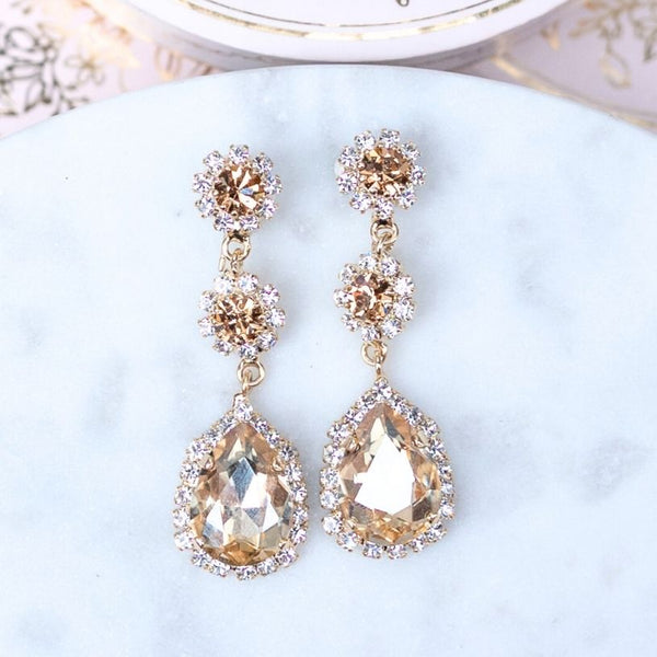 Funkelnde Glas-Kristall-Ohrstecker mit Kristalltropfen in Champagner