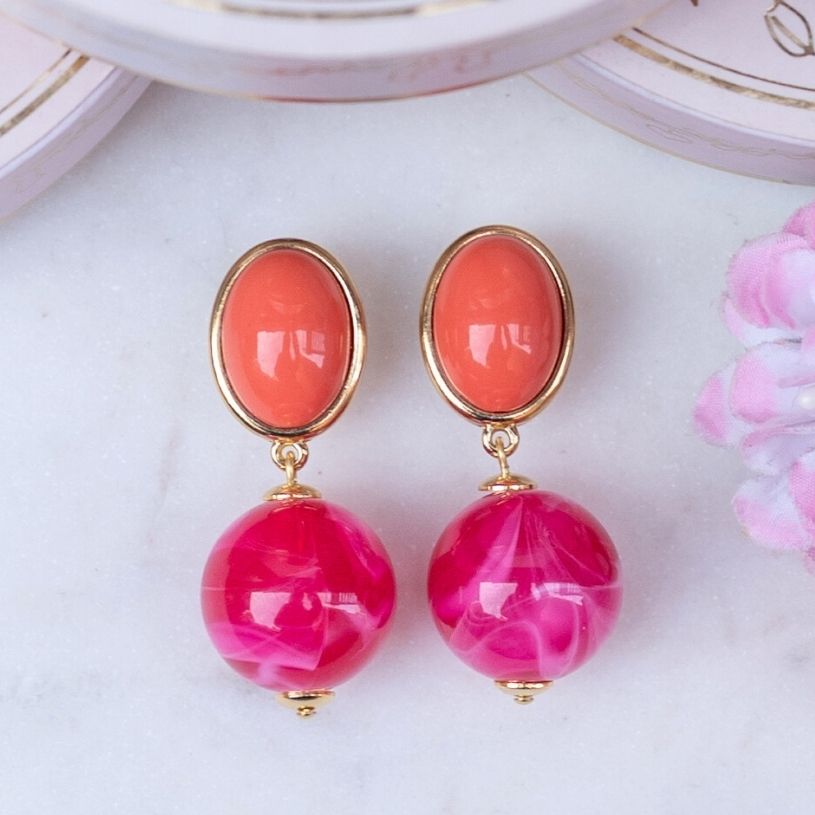 Stilvolle Kugel-Ohrstecker in Orange und Pink