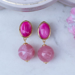 Stilvolle Kugel-Ohrstecker in Pink und Rosa
