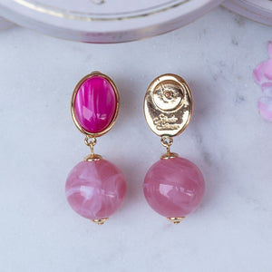 Stilvolle Kugel-Ohrstecker in Pink und Rosa