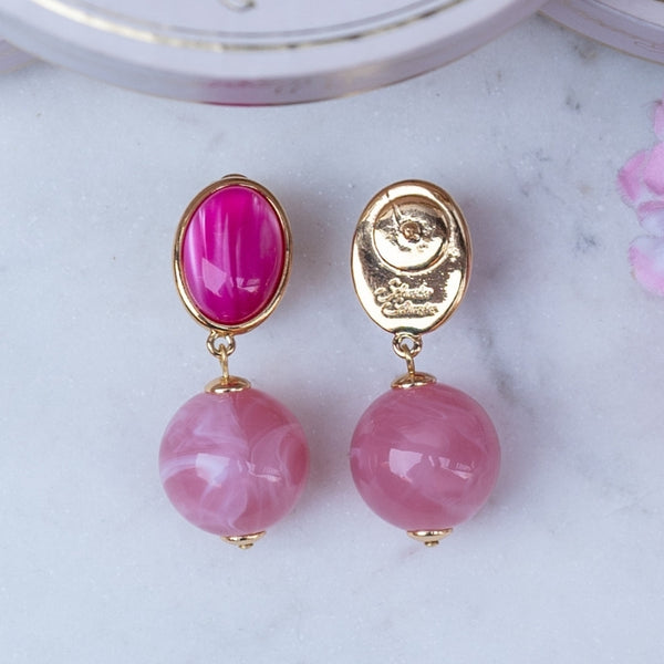 Stilvolle Kugel-Ohrstecker in Pink und Rosa