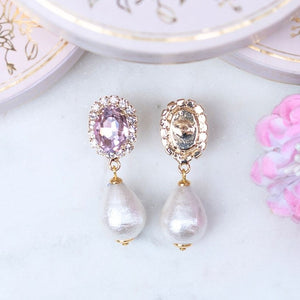 Edel funkelnde Ohrstecker in Rosa mit leichtem Baumwolltropfen