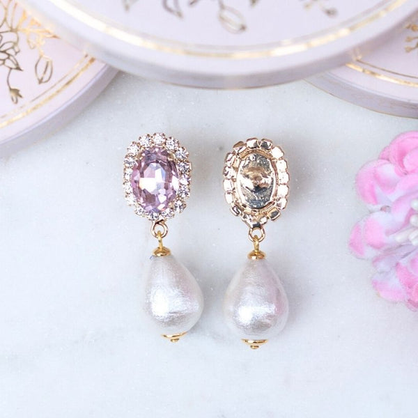 Edel funkelnde Ohrstecker in Rosa mit leichtem Baumwolltropfen