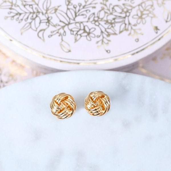Vergoldete Knoten-Ohrringe in Flechtoptik