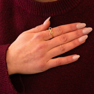 Set aus Schleifchenstecker mit edler Süßwasserperle, Fingerring mit Schleifchen und Samt-Box in Lindgrün