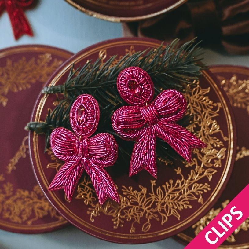 Festliche Soutacheohrclips als pinke Schleife