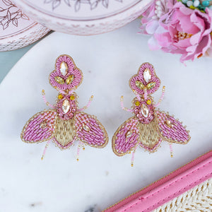 Auffällige SoutacheOhrringe als rosafarbene Hummel