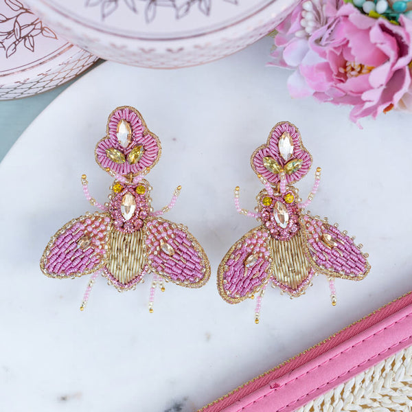 Auffällige SoutacheOhrringe als rosafarbene Hummel