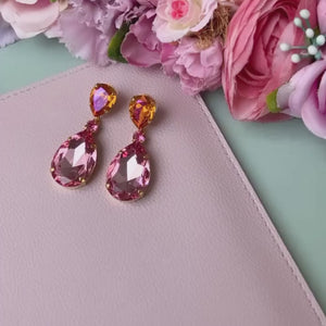 Funkelnde Ohrclips mit Glas-Kristallen in Orange und Rosa