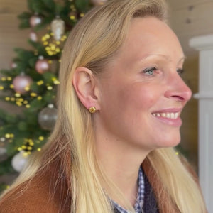 Vergoldete Knoten-Ohrringe in Flechtoptik