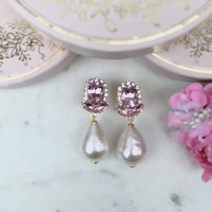 Rosafarbene Glas-Kristall-Ohrstecker mit Baumwolltropfen