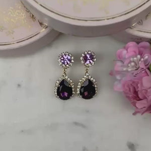 Fliederfarbene Glas-Kristall-Ohrstecker mit violettem Kristalltropfen