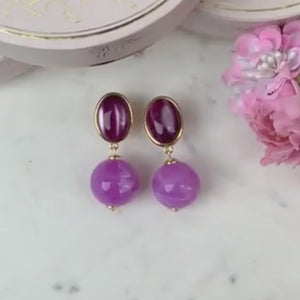Stilvolle Kugel-Ohrstecker in Violett und Flieder